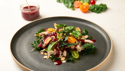 Roast vegetable and kale salad with tangy raspberry dressing